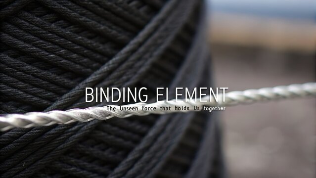 Single Strong Silver Thread Against Dark Coiled Rope