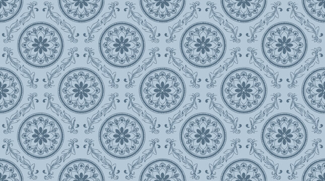 Blue mandala circular pattern seamless textile print on fabric design.
