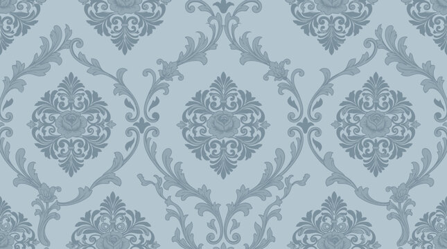 Soft blue damask wallpaper pattern with ornate repeating floral motifs and decorative arabesque details.