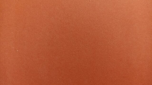 Smooth brown textured surface with subtle patterns