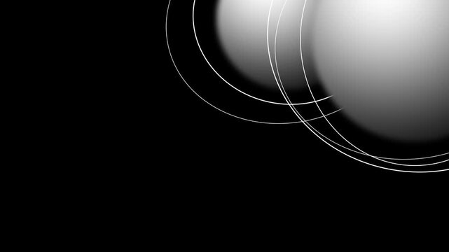A dark themed UI element showing multiple translucent silver spherical orbs floating against a black background creating a sleek futuristic abstract design