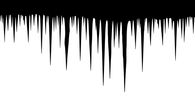 Sharp jagged icicle border on white background winter frost formation cold season decoration element frozen water drips sharp ice stalactites hanging down crisp winter atmosphere