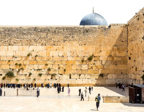 Ancient wall backdrop with courtyard and dome. Sunlit beige stone textures contrast with distant figures and blue dome