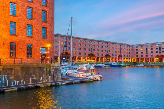 Historic red brick  dock at night with old warehouses in downtown  Liverpool