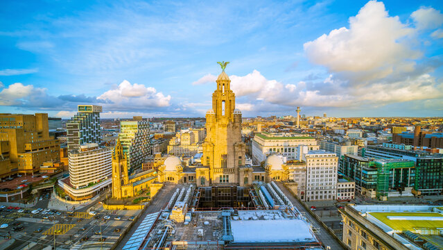 Liverpool city skyline with Royal Liver Building at Golden Hour cityscape of United Kingdom
