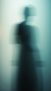 Abstract monochrome portrait of minimalist figure dissolving into fragmented transparent layers with moody cinematic lighting