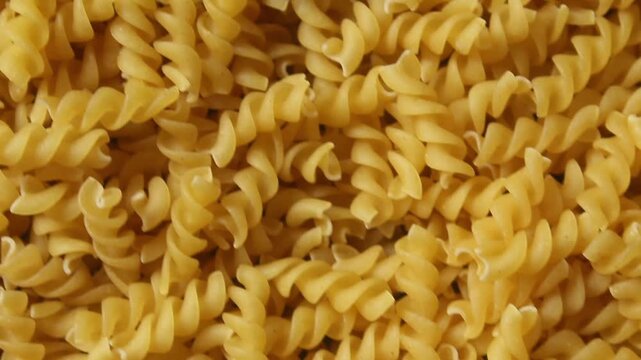 top view of a pile of uncooked fusilli pasta