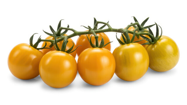 Cluster of fresh yellow cherry tomatoes on a green vine isolated on a plain white background