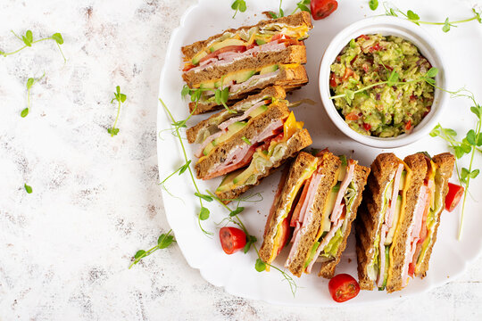 Healthy Homemade Sandwich Meal with Avocado Dip Top View. Flat lay