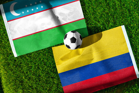 Uzbekistan vs Colombia, national flags before world championship Group K group stage match, football on green pitch with goal in the background, Mexico City, Mexico, June 17, 2026