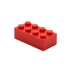 Naklejka premium Single Red Plastic Building Block Toy Brick Isolated on White Background . Red Brick with Eight Studs on white .