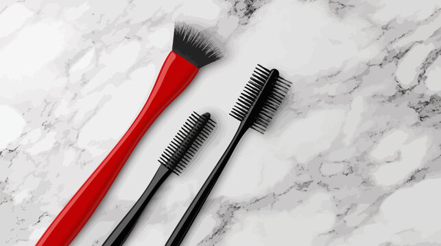 Three brushes with different purposes lie on a marble surface. The arrangement is aesthetic
