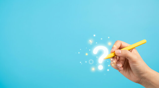 Hand holding a glowing question mark with a yellow pen on a vibrant blue background, symbolizing inquiry and ideas