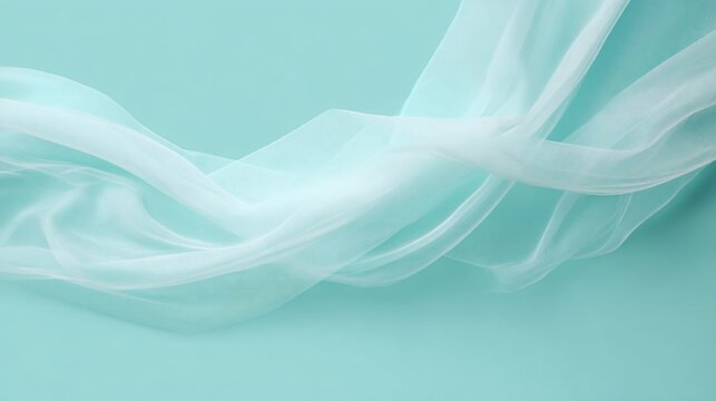 Flat lay with bridal veil flowing across pastel mint background, gentle folds creating movement, minimal styling