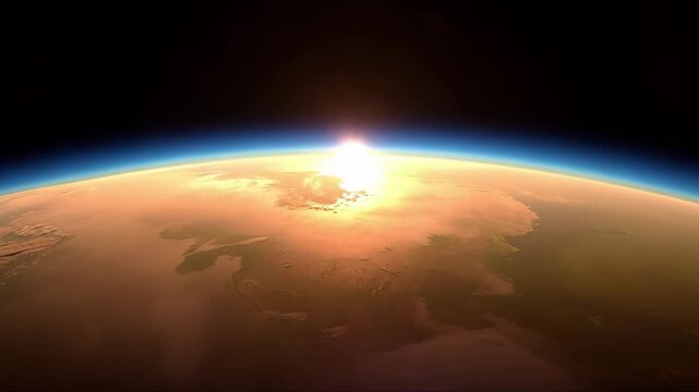 Aerial tracking shot of sunrise emerging over planetary horizon revealing desert landscape from orbit