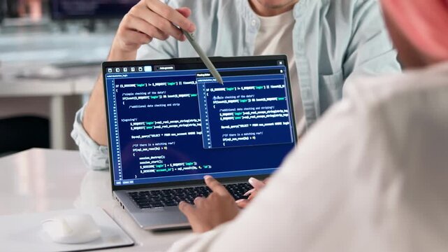 Programmer Writes Clean Code On Computer While Collaborating