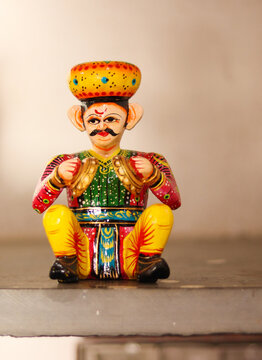 A Varanasi clay art in vibrant colors, home decor, handicraft, toy, doll, souvenir, culture, ethnic, art and craft, Indian art.