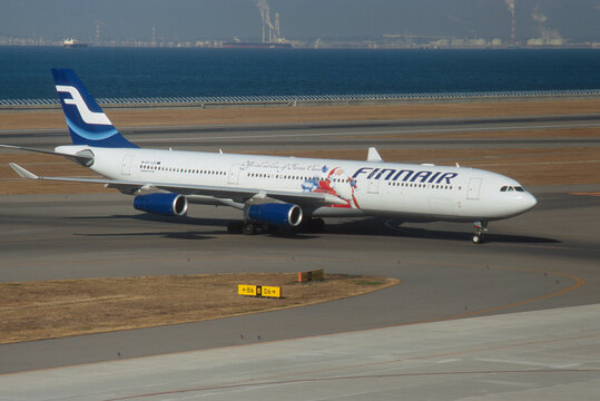 Tokoname, Japan - January 15, 2008. Close-up of a finnair airbus A340 Taxiing at Nagoya Airport in Japan.