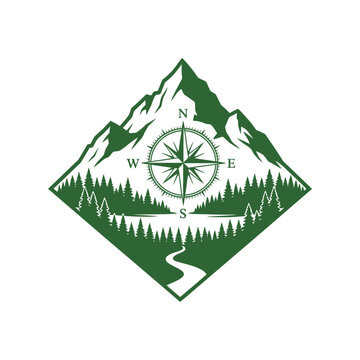 Vintage badge logo design featuring mountain peaks and a forest with a navigation compass for outdoor adventure travel