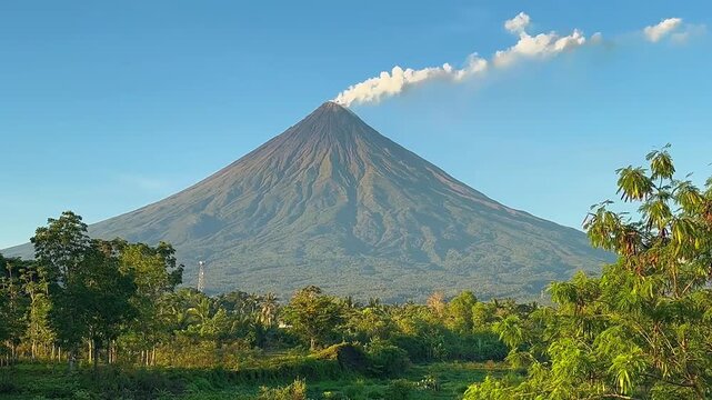 Mt. Mayon Volcano with smoke Timelapse and river reflection in legazpi city albay Philippines 