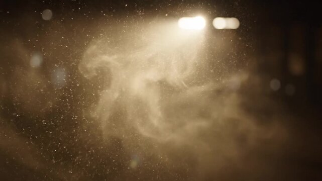 Dust Particles Floating in Warm Light in Indoor Night Scene