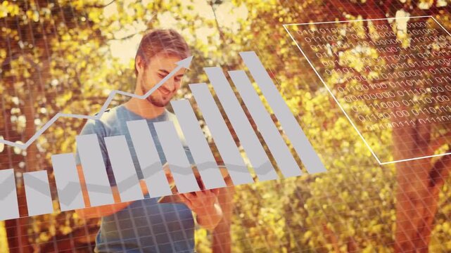 Man tapping tablet in woods, initiating data collecting and analyzing with overlaid charts for tech