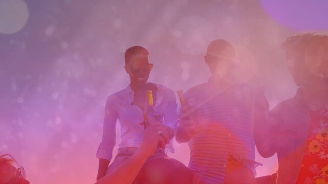 Bearded man passing beers friends on tailgate clinking beers toasting beach magenta wash marketing