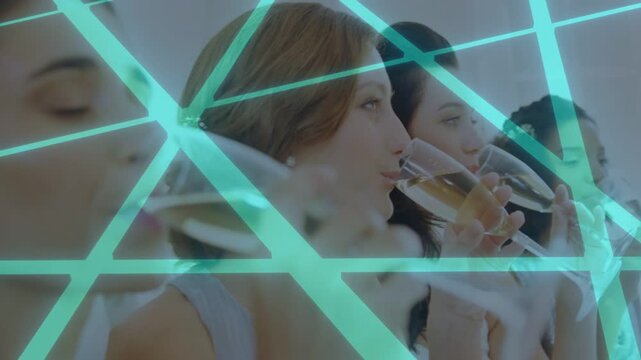At toast cue, women lifting flutes and sipping event toast, teal overlay crossing faces and glasses