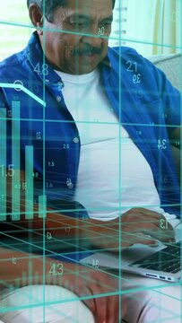 Vertical video: Senior man tapping pad on sofa partner glancing teal chart animating for finance