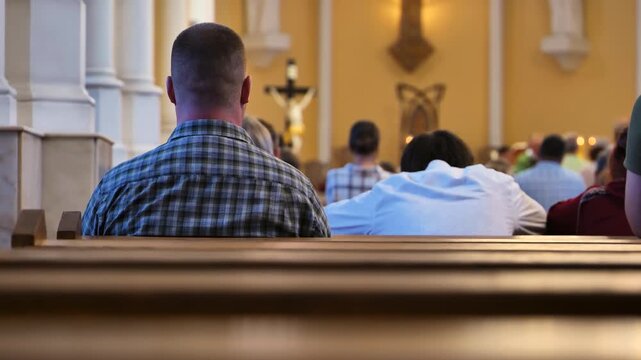 People praying during Catholic Church Mass, parishioners attending religious service in pews