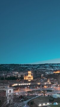 Tbilisi, Georgia. Timelapse Evening Scenic View Of City Center In Lighting Elevated View