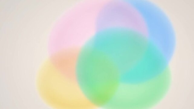 Soft pastel blobs morphing organically.
