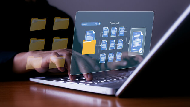 Businessman using tablet for Document Management System DMS, managing business processes with digital security to organize, store, and share corporate documents and files