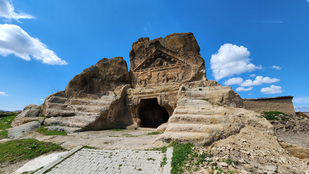 In Eskişehir, Turkey, the Solon&rsquo;s Tomb (Lion Temple) in Phrygian Valley, showing its rock-cut fa&ccedil;ade with Roman-era lion reliefs beneath a triangular pediment featuring symbolic motifs