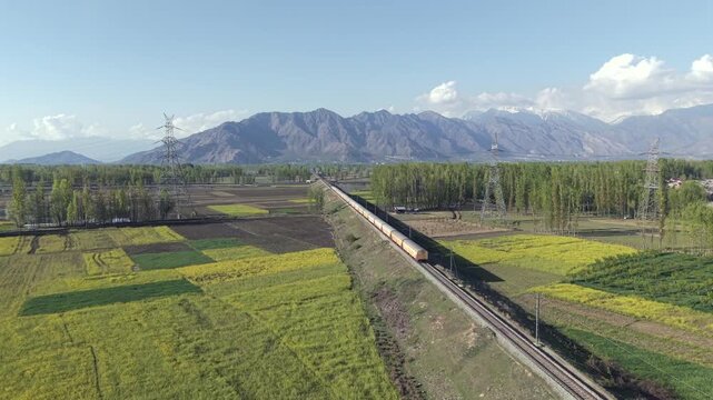 Aerial View of Train Passing Pampore Station in Srinagar Kashmir