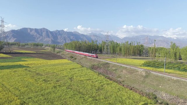 Aerial View of Train Passing Pampore Station in Srinagar Kashmir