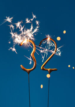 32 years celebration festive background made with Bengal fires in the form of number Thirty two. Vertical photography.