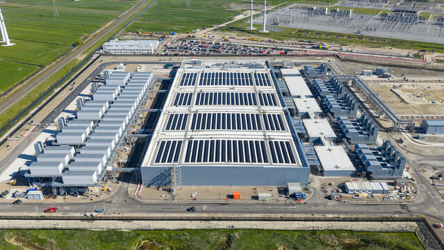 Drone view of hyperscale datacenter in Westpoort, Groningen, featuring big data, AI infrastructure, machine learning, cloud services, and sustainable digital development.