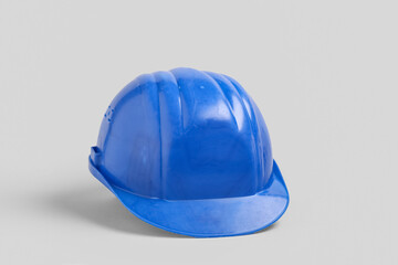 Fototapeta premium Blue hardhat on white background