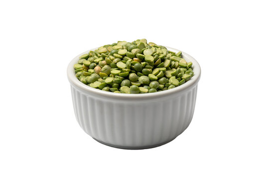 Close‑up of green split peas in a ribbed ceramic bowl on a white background, showing natural texture and vibrant color typical of dried legumes used in soups and stews
