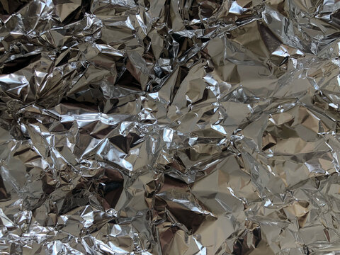 Full frame background of crumpled aluminum foil