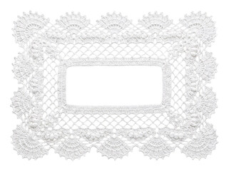 Intricate white lace doily, rectangular shape with ornate patterned edge. © RK graphics