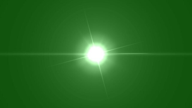 Bright white star light burst effect with light rays on green background. ray center glow sparkle shine, lens flare effect, optical flare shine light, abstract glow sparkle lens flares blinking light.