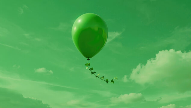 A green balloon floating in the air with a vine attached, great for outdoor or nature-themed illustrations