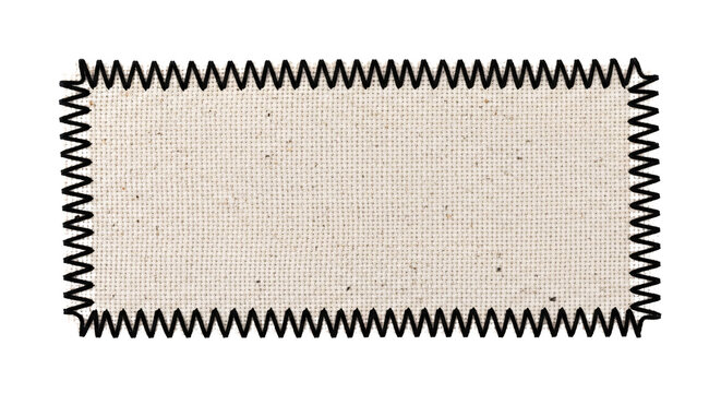 Rectangular blank fabric patch with zig zag edge stitching.