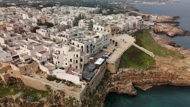 Aerial view of Polignano a Mare cliffs and Adriatic coastline Italy