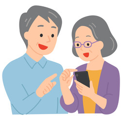 Obraz premium スマートフォンを覗き込むシニア夫婦