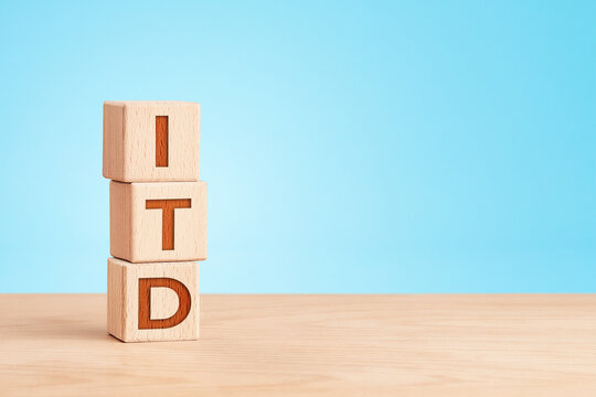 Information technology concept with wooden cubes on blue background