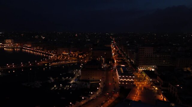Night Aerial View of Bari City Streets and Illuminated Urban Traffic