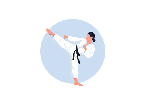 Martial artist performing high kick in traditional uniform